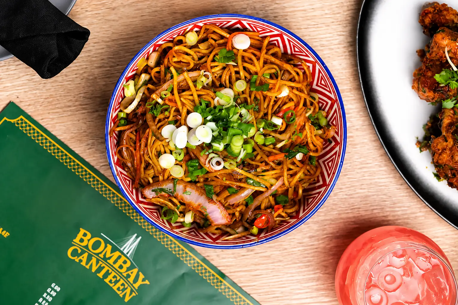 Delicious bowl of Indo-Chinese Hakka Noodles garnished with spring onions