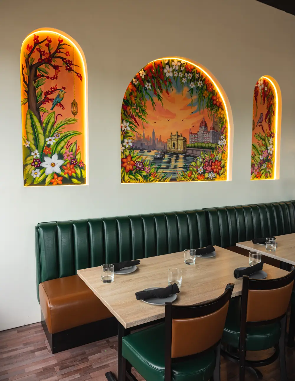 Comfortable booth seating and window view inside Bombay Canteen